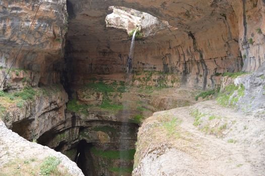 Explore the mesmerizing Baatara Gorge waterfall and cavern in the majestic landscape of Lebanon.