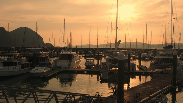 Breathtaking sunset view of Langkawi Yacht Marina in Kedah, Malaysia, highlighting leisure and luxury.