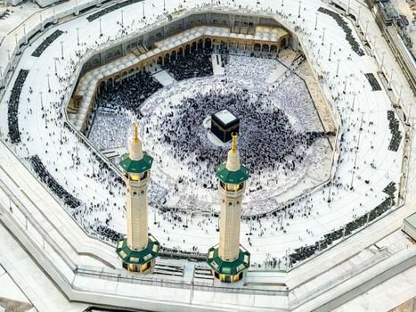 Aerial shot capturing worshippers performing Hajj at the Kaaba, Mecca.